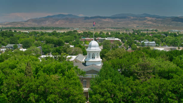 istock US and Nevada Flag Flying Over State Capitol Building 1341967262