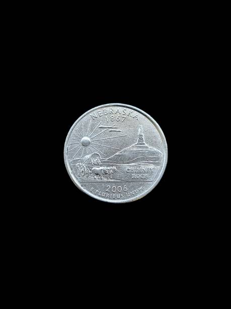 istock USA Dollar coins nebraska isolated. 1341969734