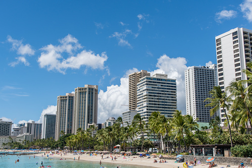 Honolulu, Hawaii, USA - September 11th 2021: Scenic panoramic Waikik Beach vista on a beautiful sunny, Honolulu, Oahu, Hawaii