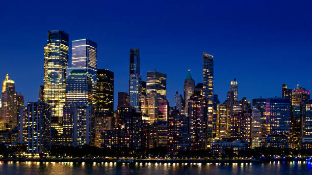 istock Lower Manhattan at Night - Aerial 1341973534