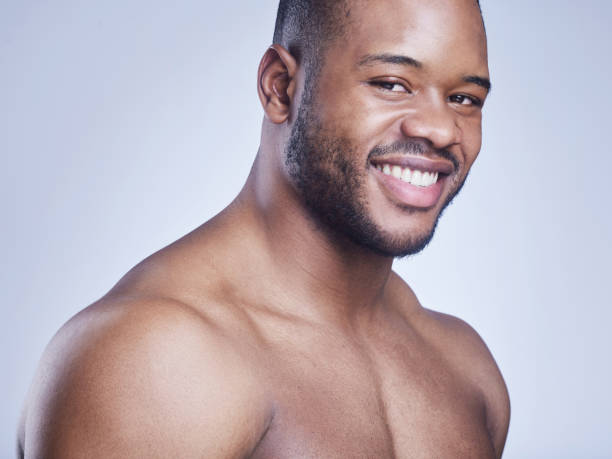 istock Studio shot of a handsome young man posing against a grey background 1341975399