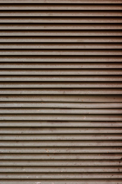 istock Rusting vented side of a large industrial air conditioning unit 1341983324