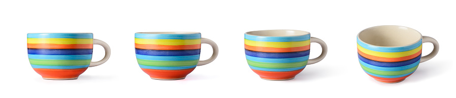 multi-color striped ceramic tea cup with a wide open rim and a small base, single finger hook handle, shot in different angles view, porcelain cup used for drinking hot drinks isolated on white background