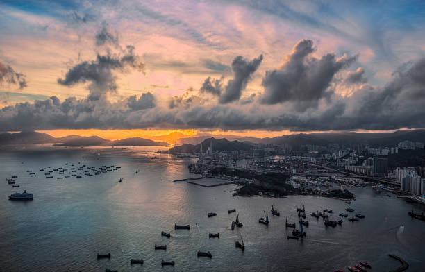 istock Sunset on the stonecutter bridge and container terminals in Hong Kong 1341984252
