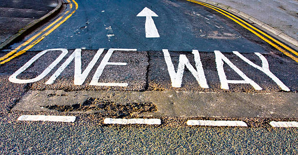 One Way Arrow One way sign painted on road one way stock pictures, royalty-free photos & images