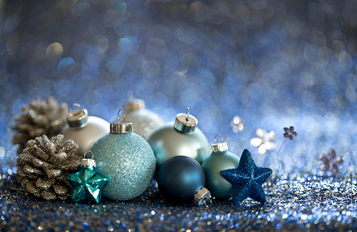 Christmas Blue Baubles on a Blue Background. Very Shallow Depth.