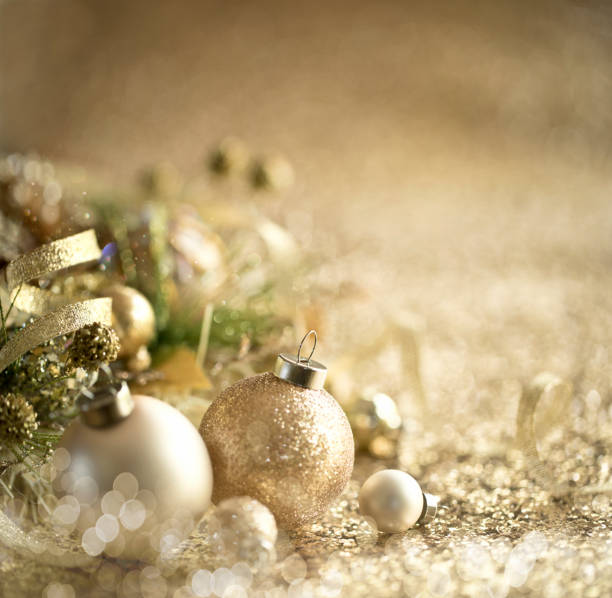 istock Christmas Gold Baubles Background 1341987929