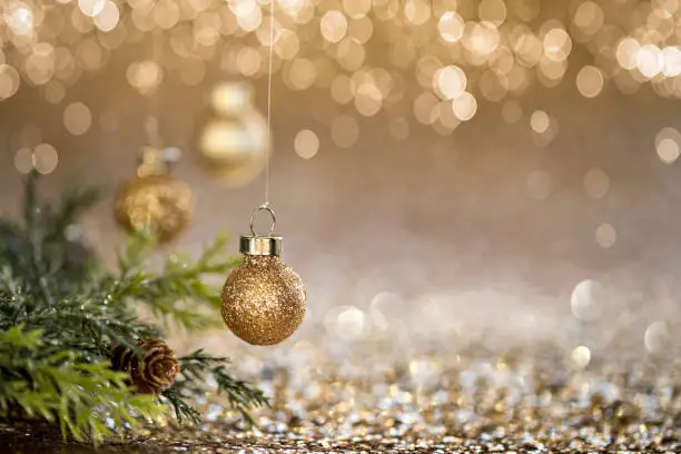 Photo of Christmas Gold Baubles Background