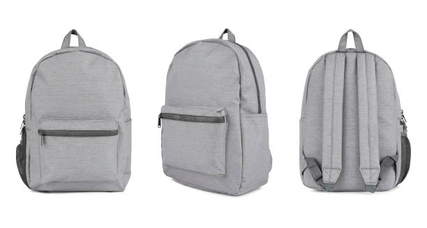 Grey backpack Grey backpack on isolated background leather clasp stock pictures, royalty-free photos & images