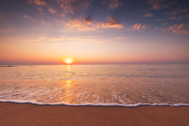 istock Beautiful cloudscape over the sea shore, sunrise shot 1341994986