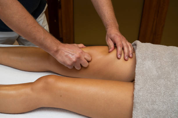 istock Woman getting legs massage in spa salon 1341996813