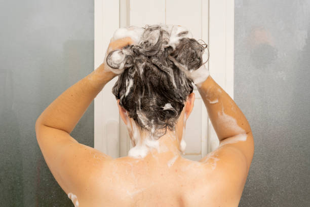 istock Girl in th shower. 1341997704