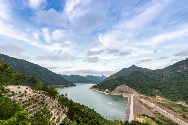 istock Reservoirs and mountains under the blue sky 1341997837