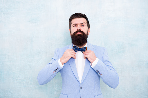 Man bearded hipster formal suit with bow tie. Wedding fashion. Formal style perfect outfit. Impeccable groom. Tips for dealing pre wedding anxiety. Tips for grooms. How to beat nerves on wedding day.