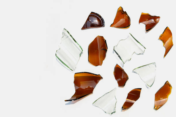 istock Glass shards isolated on white background. 1341999883