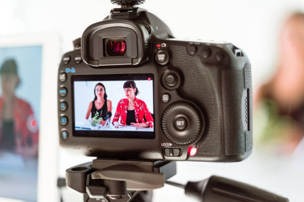 istock Young women making a video blog in the office 1342004838