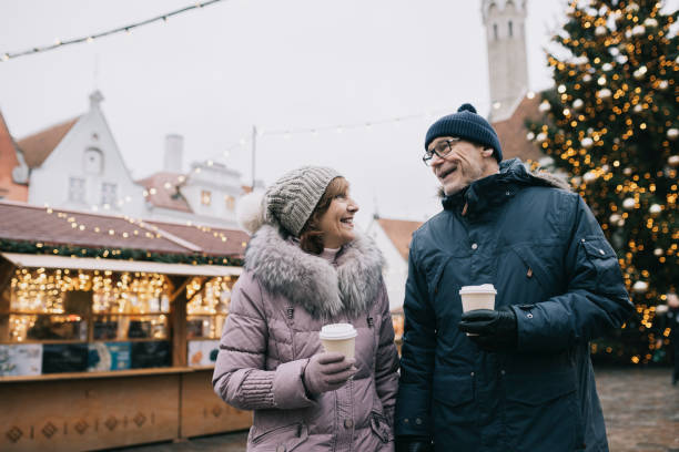 istock Senior couple enjoying Christmas market 1342009355