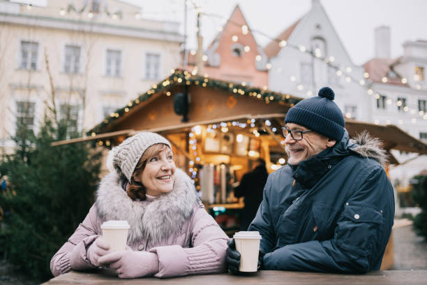 istock Senior couple enjoying Christmas market 1342009363