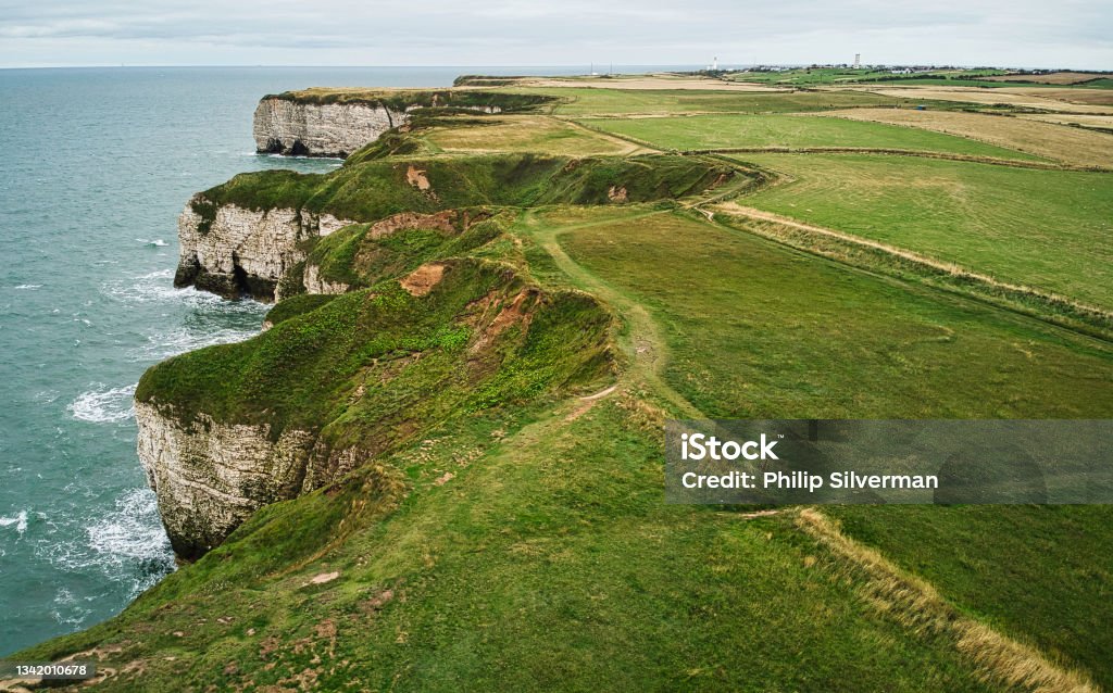 Aerial view of sea cliffs and coastline at Flamborough, Yorkshire, England, Britain Drone point of view of coastal features North Sea Stock Photo
