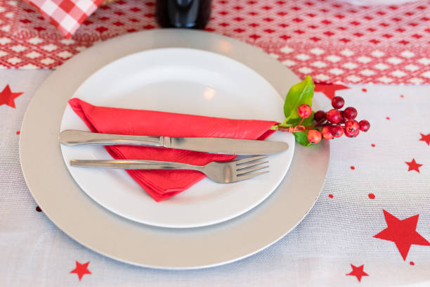 istock Plates with cutlery, holy and decorations on christmas table 1342010791