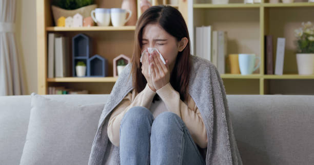 istock asian woman cough at home 1342013196