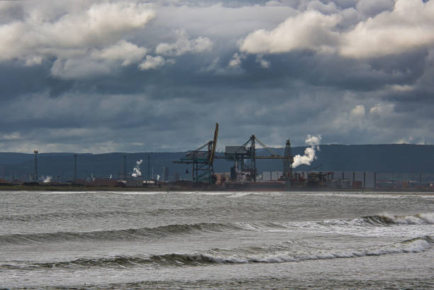Cranes along coast at Teesport, Redcar, Teeside, England, Britain Industrial architecture on coastline teesside northeast england stock pictures, royalty-free photos & images