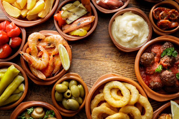 Spanish Food: Tapas Still Life Spanish Food: Tapas Still Life patatas bravas stock pictures, royalty-free photos & images