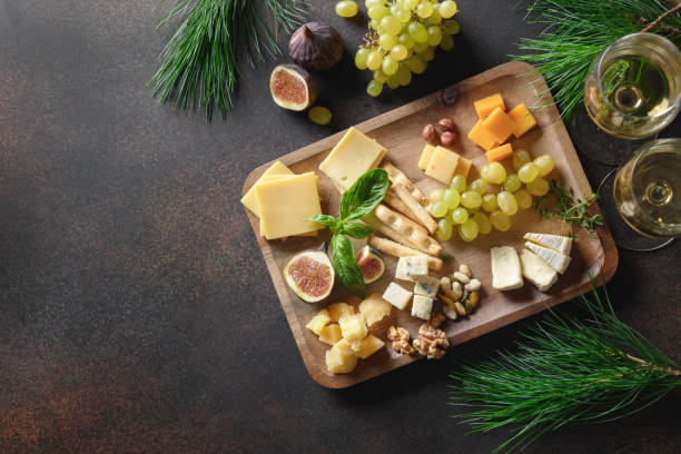istock Christmas ceese platter with different cheese and appetizer. 1342025484