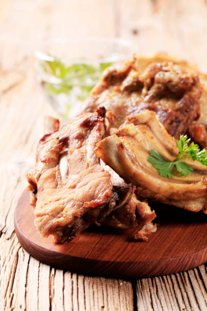 istock Roast pork ribs on a cutting board 134203058