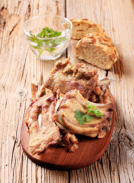 istock Roast pork ribs on a cutting board 134203062