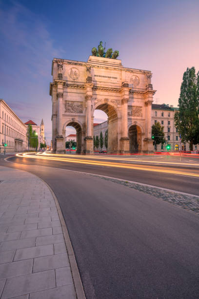 Munich, Germany. Cityscape image of Munich, Bavaria, Germany with the Siegestor at summer sunset. siegestor stock pictures, royalty-free photos & images