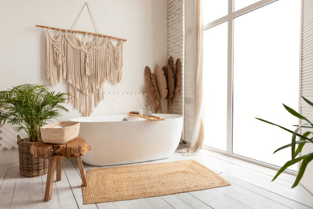 istock Cozy Empty Modern Bathroom Background With White Bathtub And Window 1342035751