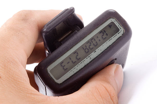 hand holding with pager on white background