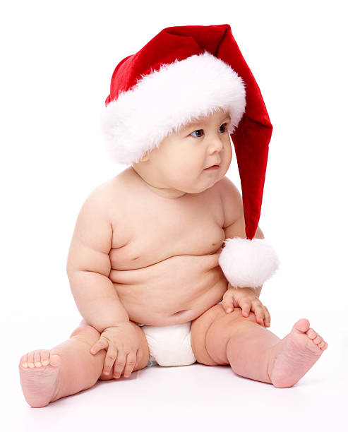 istock Little child wearing red Christmas cap 134203988