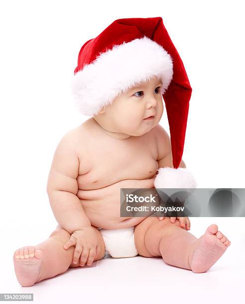 Little Child Wearing Red Christmas Cap Stock Photo - Download Image Now - 6-11 Months, Babies Only, Baby - Human Age