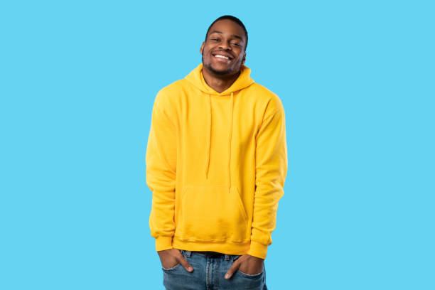 istock Happy African Guy Posing With Hands In Pockets, Blue Background 1342042292