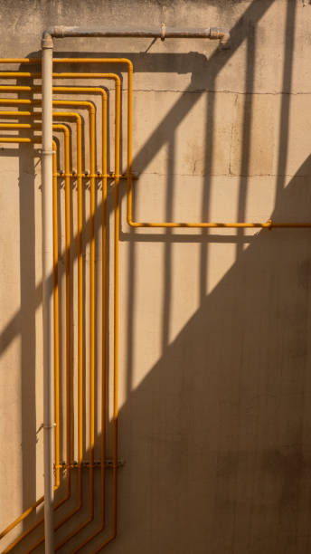 istock yellow pipes on the wall 1342050181