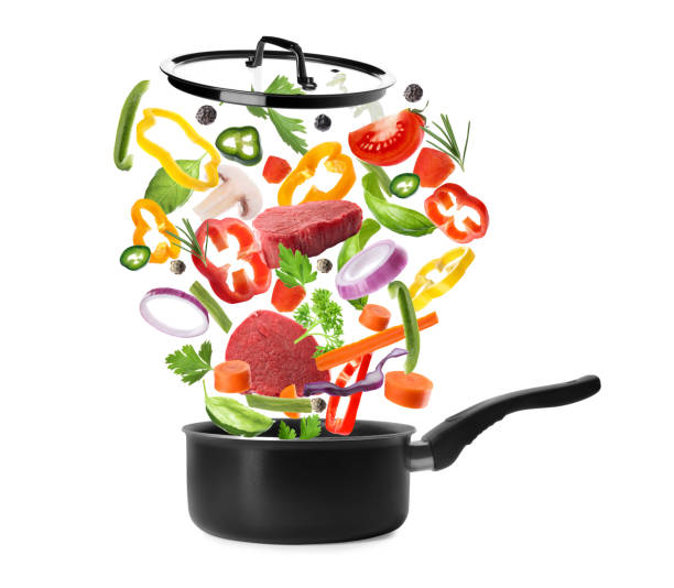 istock Pot and fresh ingredients for soup on white background 1342051390