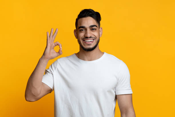 istock Cheerful arab guy showing okay gesture and smiling 1342051704