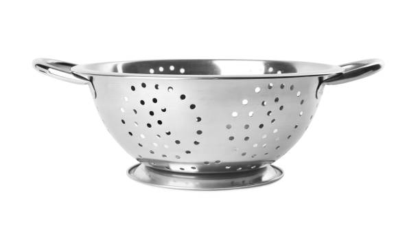 istock New clean colander isolated on white. Cooking utensils 1342052006