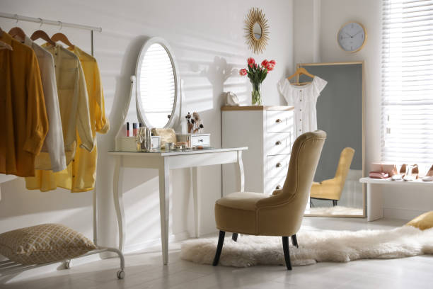 istock Stylish room interior with elegant dressing table, mirror and comfortable chair 1342052063