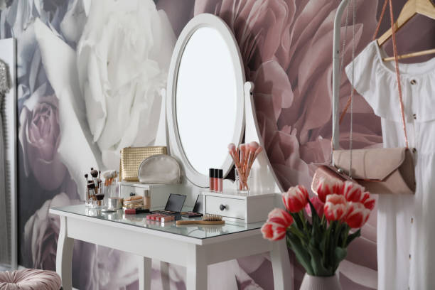 istock Stylish room interior with elegant dressing table and floral wallpaper 1342053800