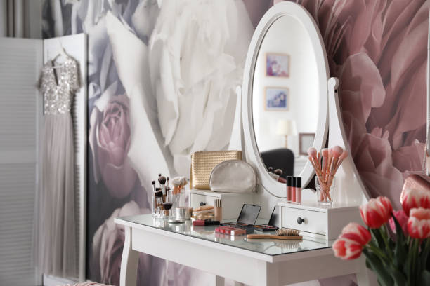 istock Stylish room interior with elegant dressing table and floral wallpaper 1342053880
