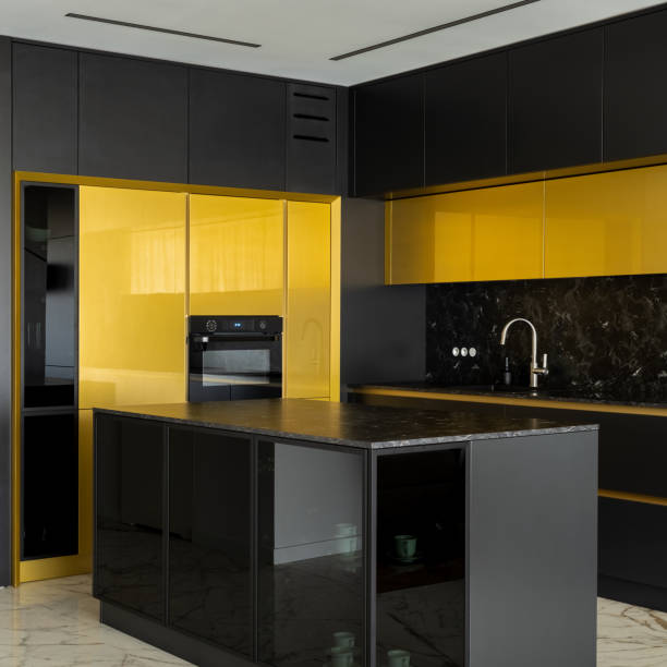 istock Stylish, black and gold kitchen 1342054718