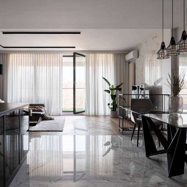 istock Luxury and spacious apartment with open window doors 1342054734