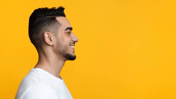 istock Profile portrait of cheerful arab guy looking at copy space 1342055570