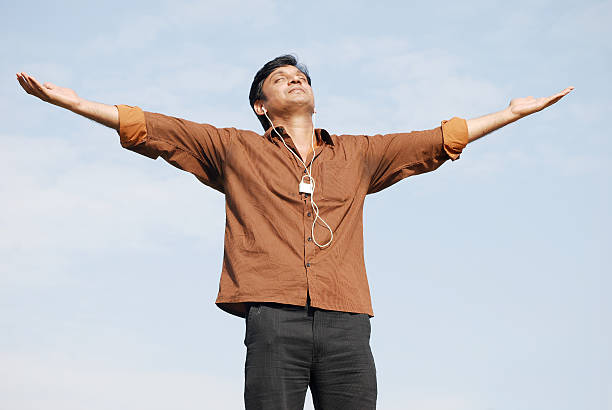 istock Young man listening to music 134205671