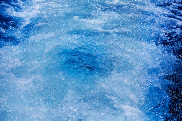texture de lavage bleu mer océan pro wake - prop wash photos et images de collection