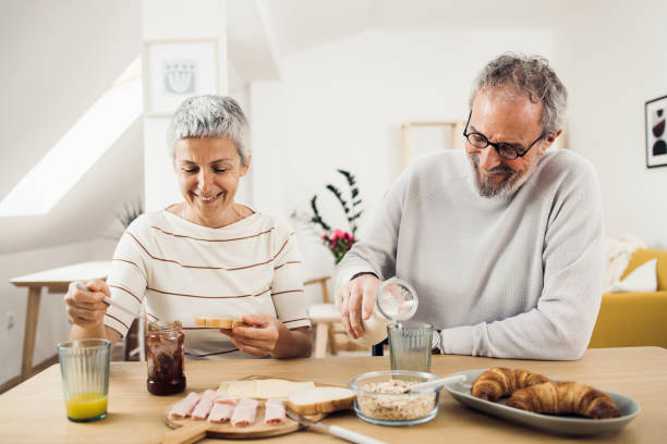 istock Happy seniors eating their healthy breakfast 1342056974