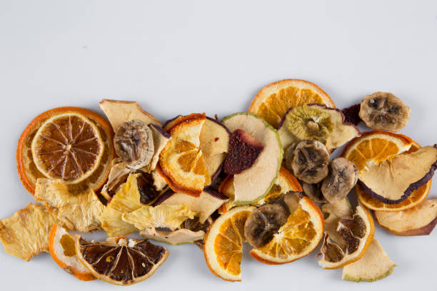 istock Mixed colorful dried fruits isolated on white background with empty copy space for your text. 1342057124